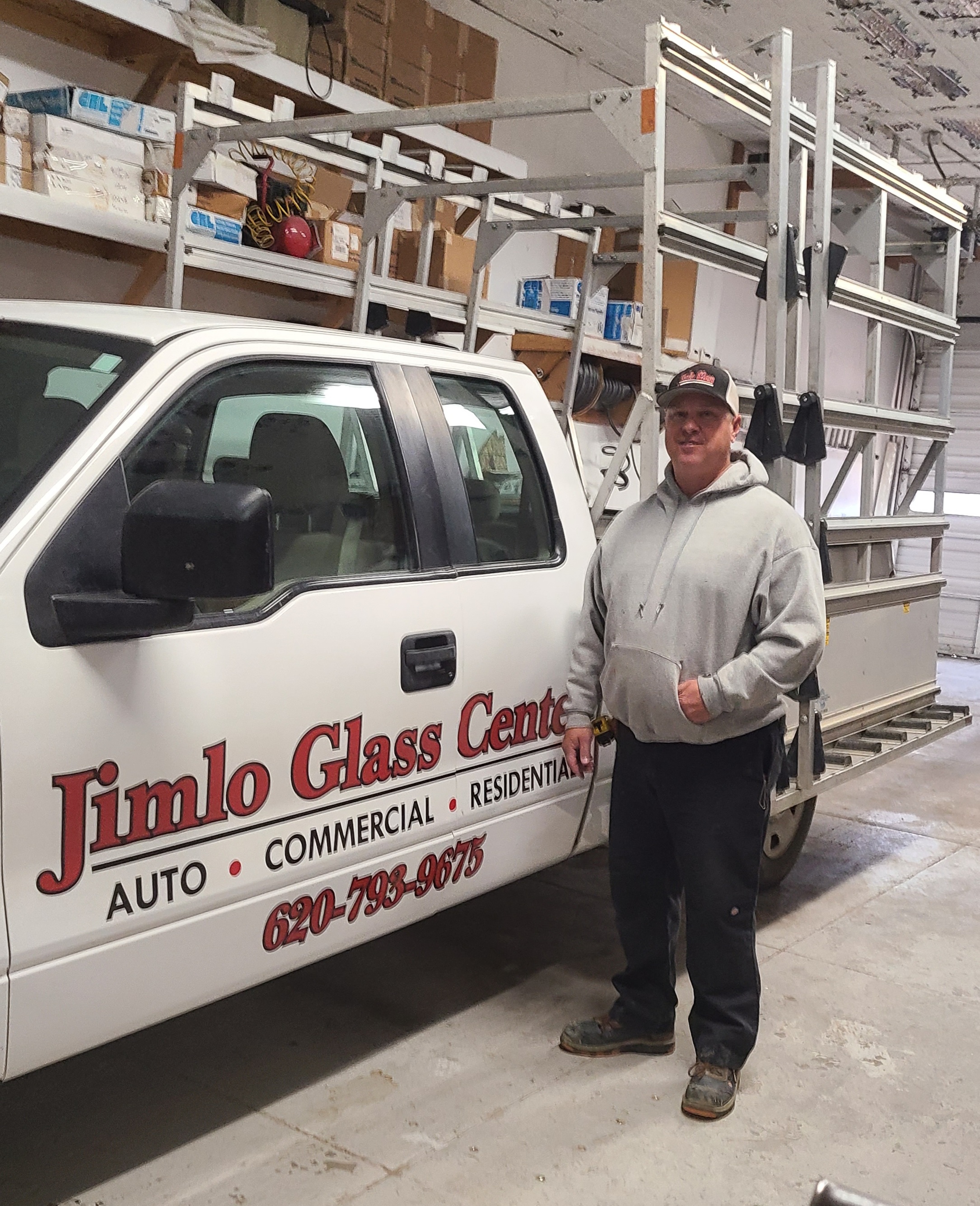 Man running glass machine